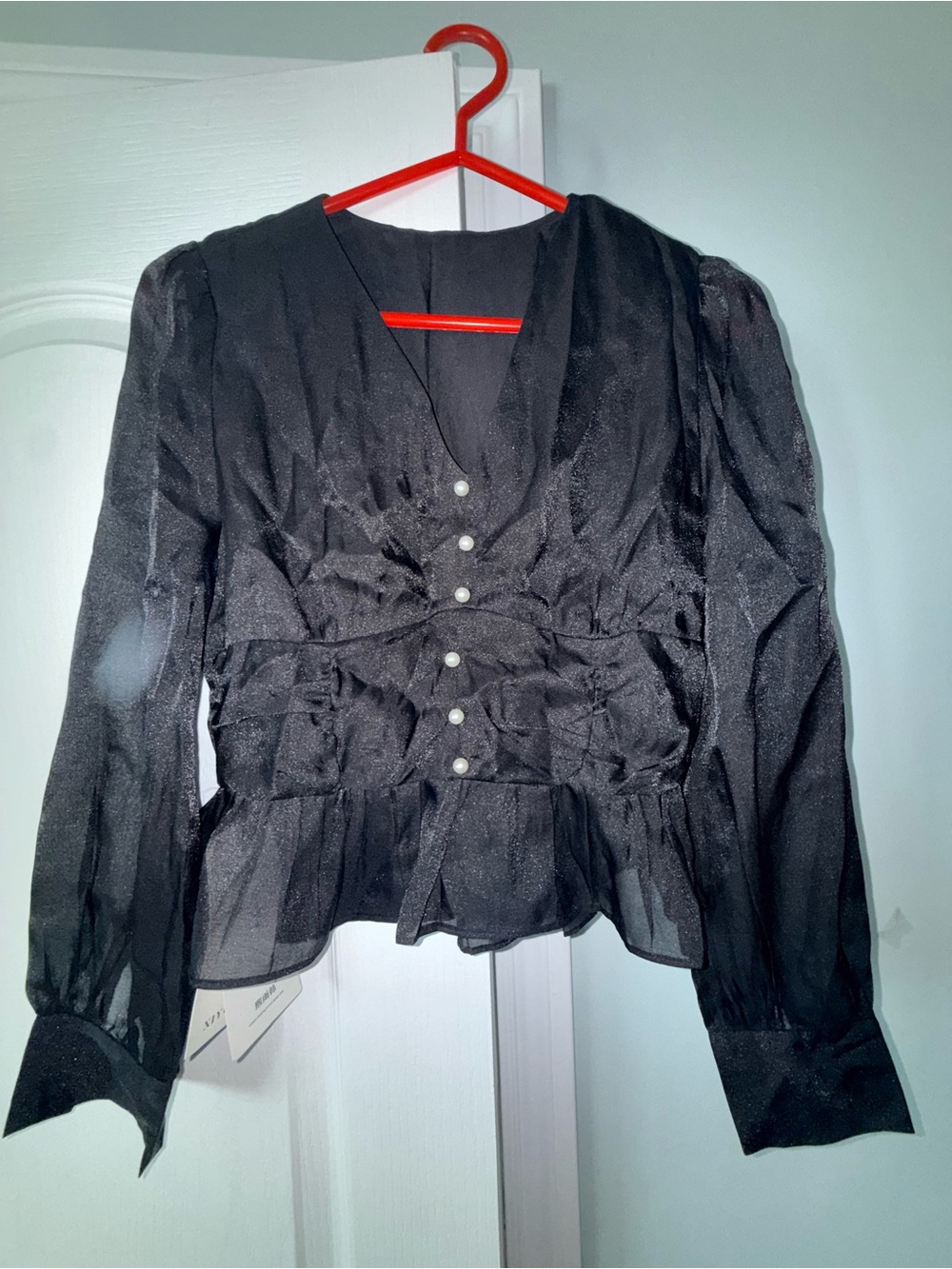 Black Long-Sleeve Sheer Peplum Blouse